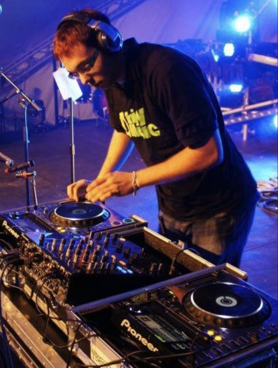 Midnight Soup mixing under blue stage lights